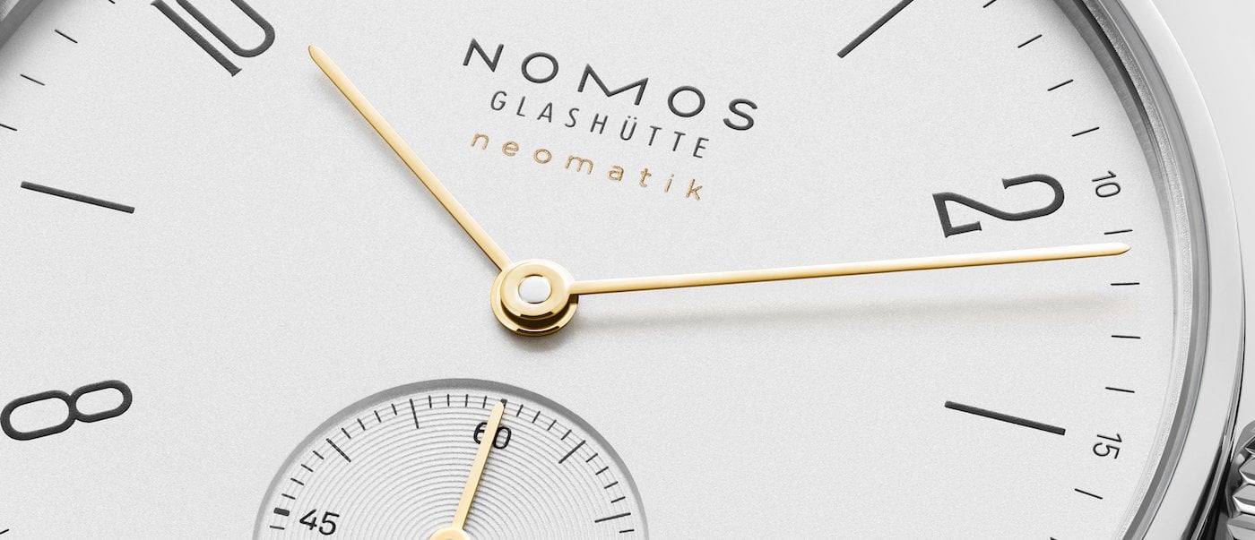 Nomos Orion neomatik doré and Tangente neomatik doré